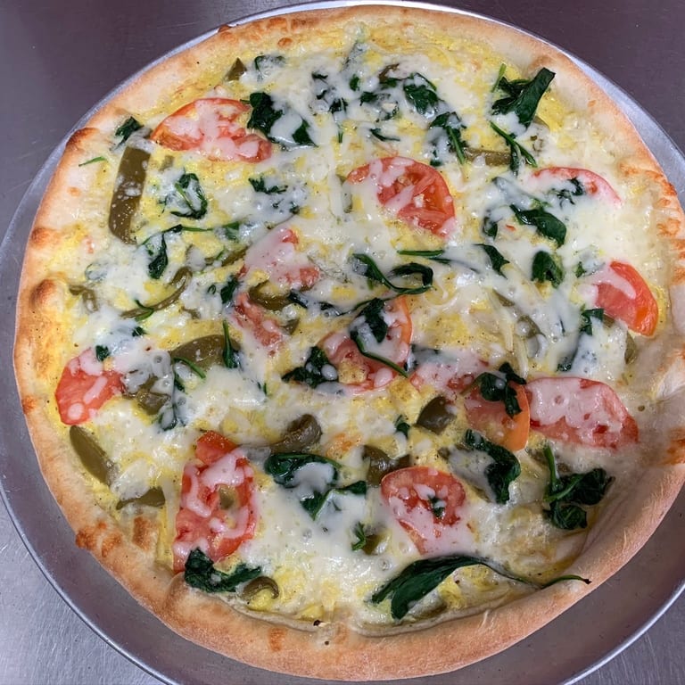 Savor our veggie pizza